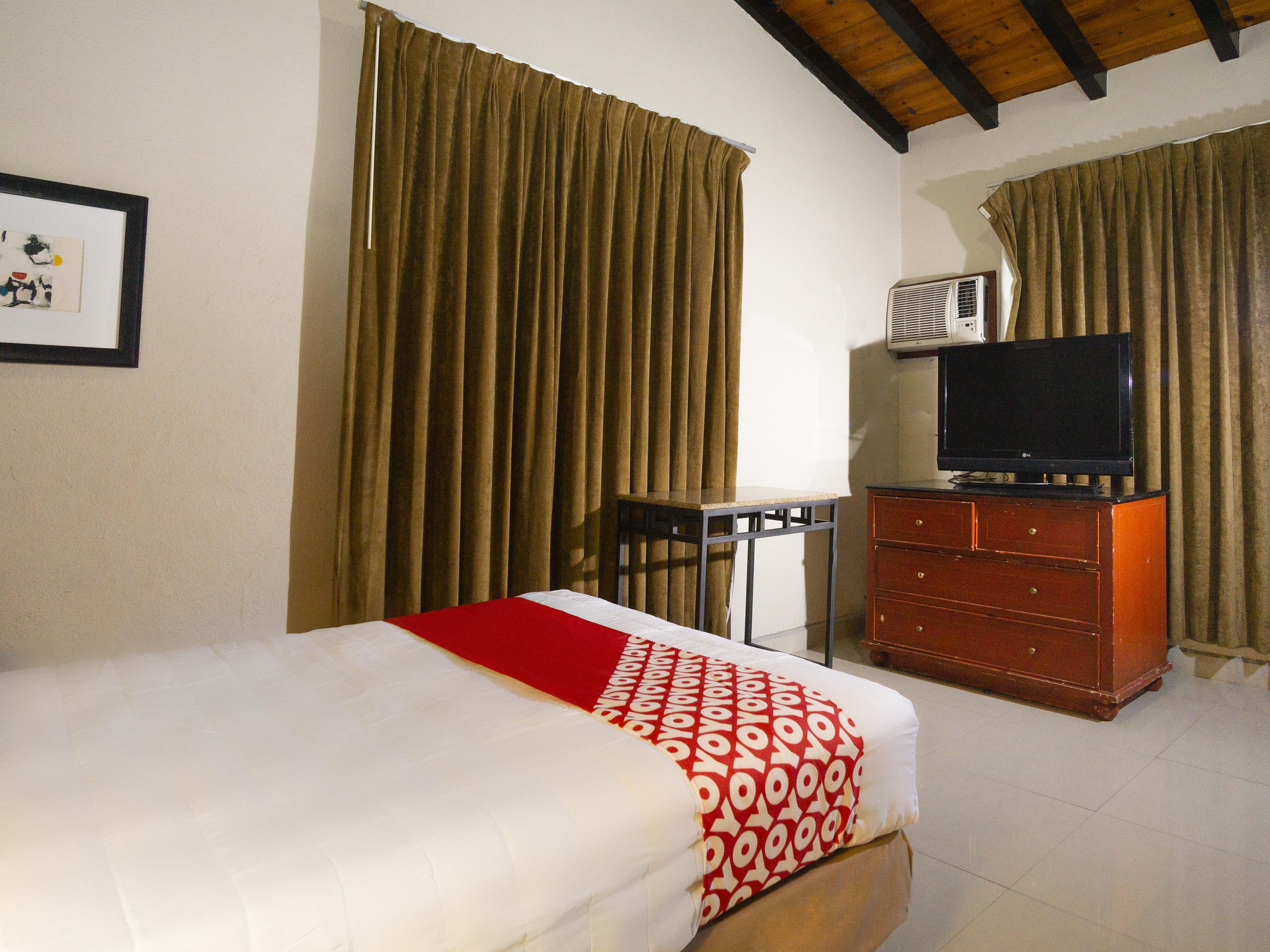 Oyo Hotel Hacienda Don Luis, Розаріто Екстер'єр фото A room at the hotel