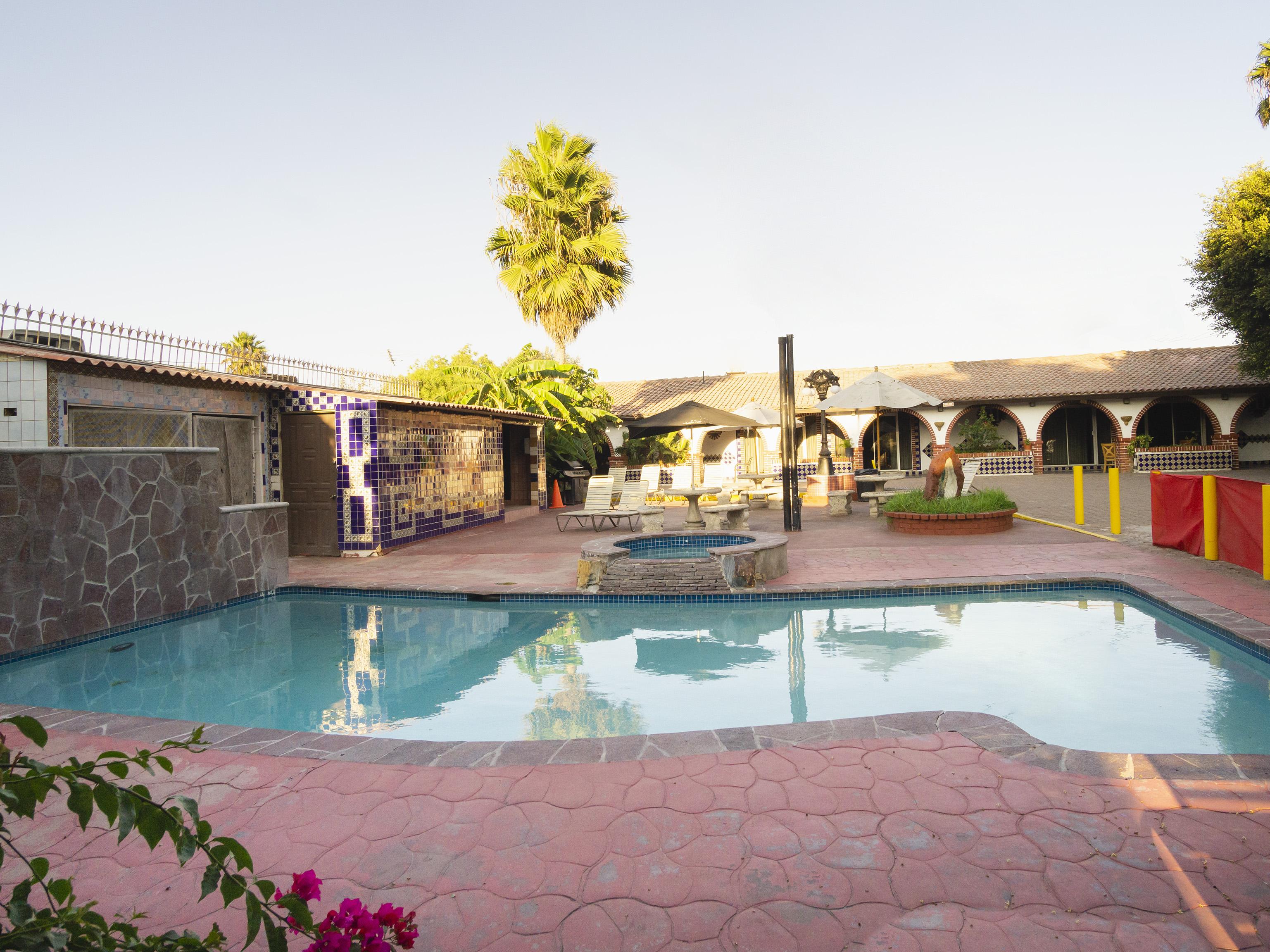 Oyo Hotel Hacienda Don Luis, Розаріто Екстер'єр фото The pool at the Oasis of Minium